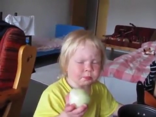 girl eating onion