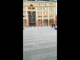 wind blows pedestrians in holland